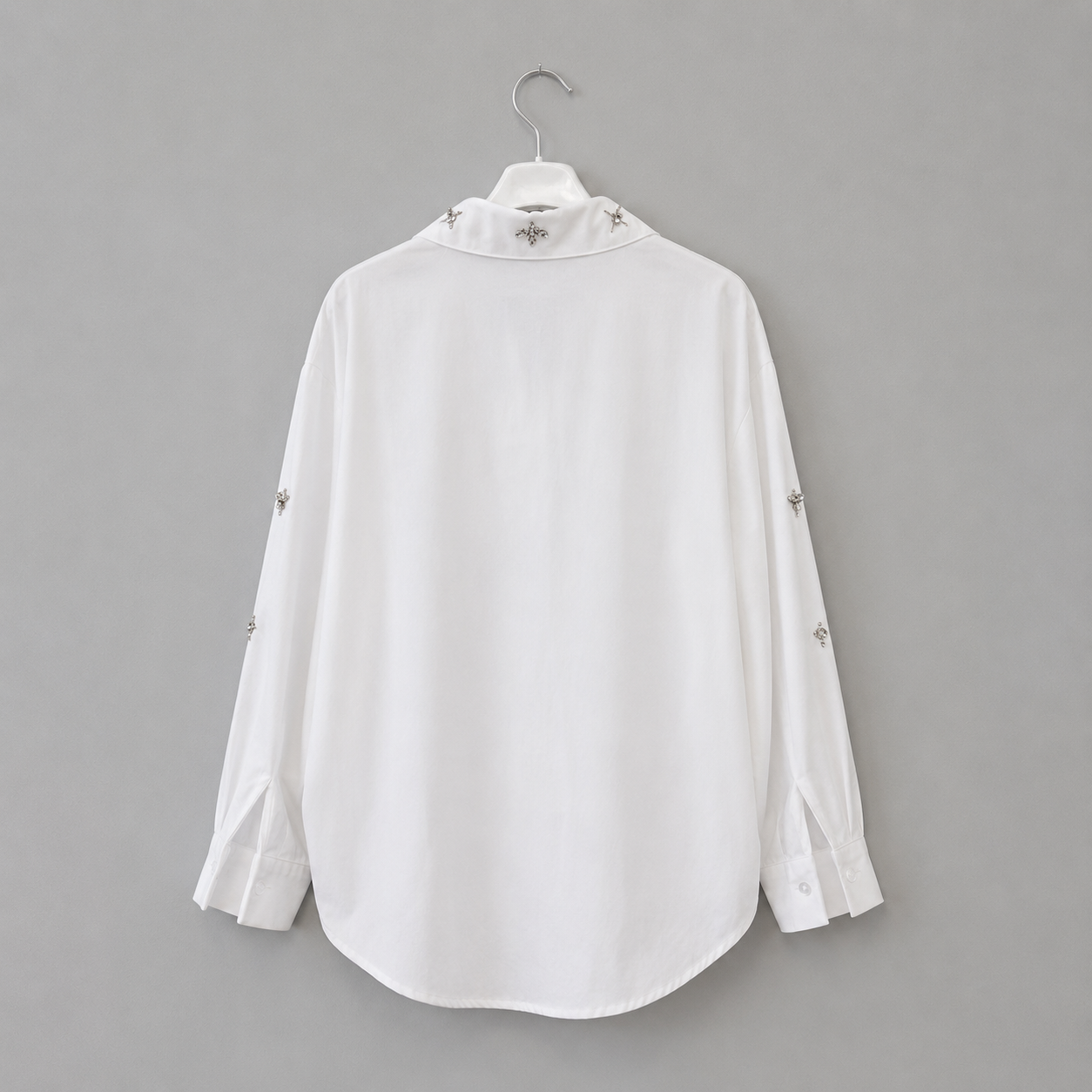 Bluse mit Schmuckapplikationen | Gr. 40-44