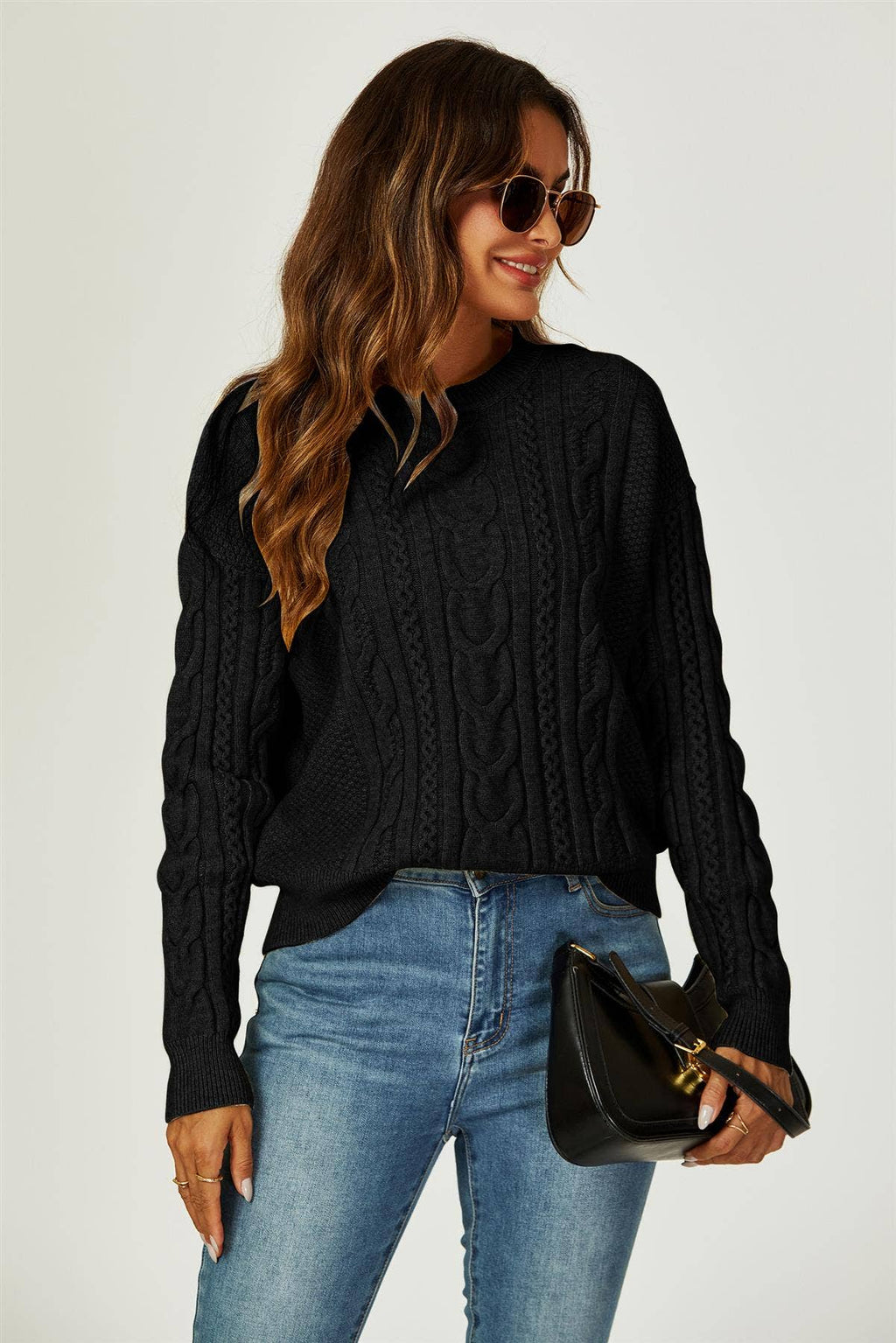 Schwarzer Pullover mit Rundhalsausschnitt und Zopfmuster Gr. 40-42