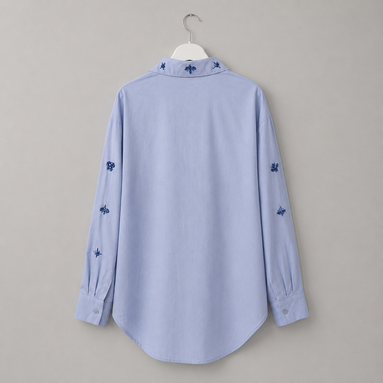 Bluse mit Schmuckapplikationen | Gr. 40-44 | Hellblau