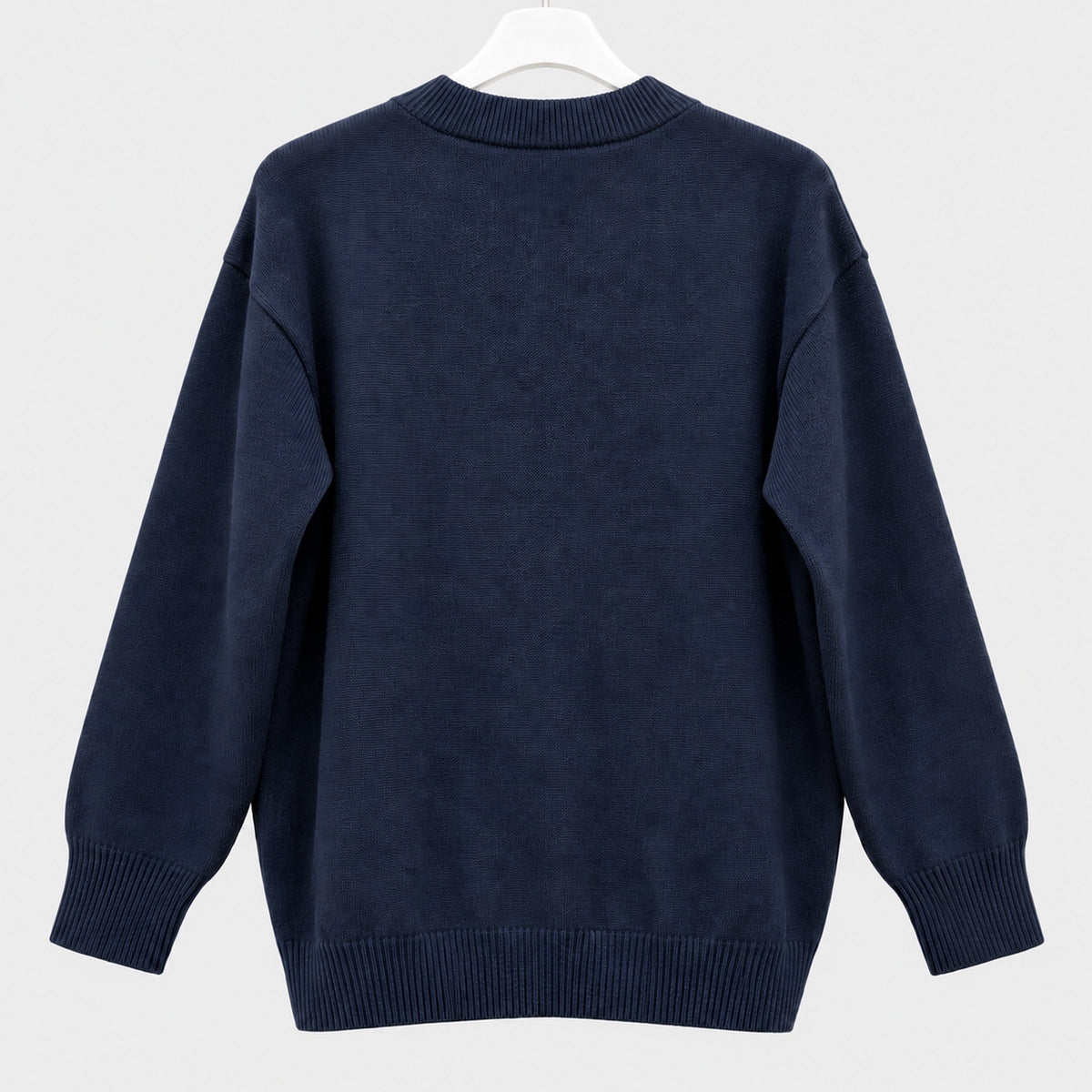 Dunkelblaue Strickjacke mit hellblauer 3D‑Schleife Gr. 38-40