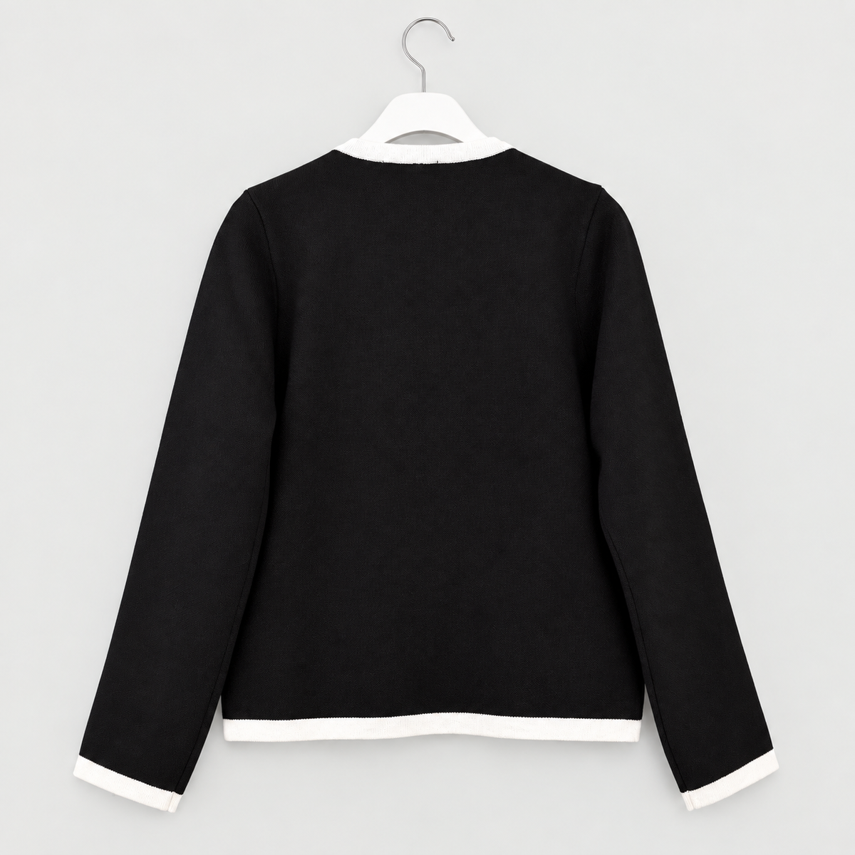 Elegante Strickjacke mit Kontrastdetails und Hakenverschluss | Gr. 38