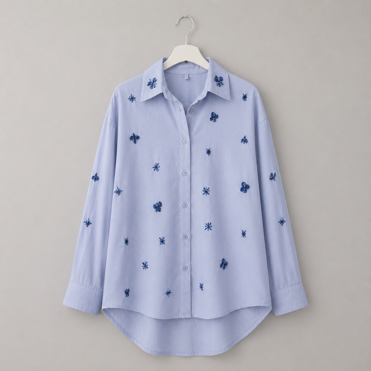 Bluse mit Schmuckapplikationen | Gr. 40-44 | Hellblau