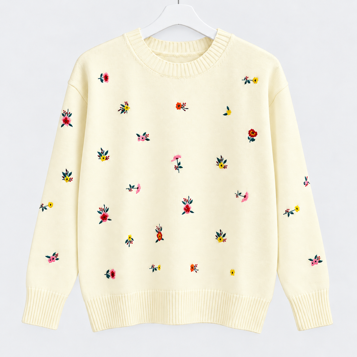 Pullover in Creme mit Blumenstickerei Gr. 40-42