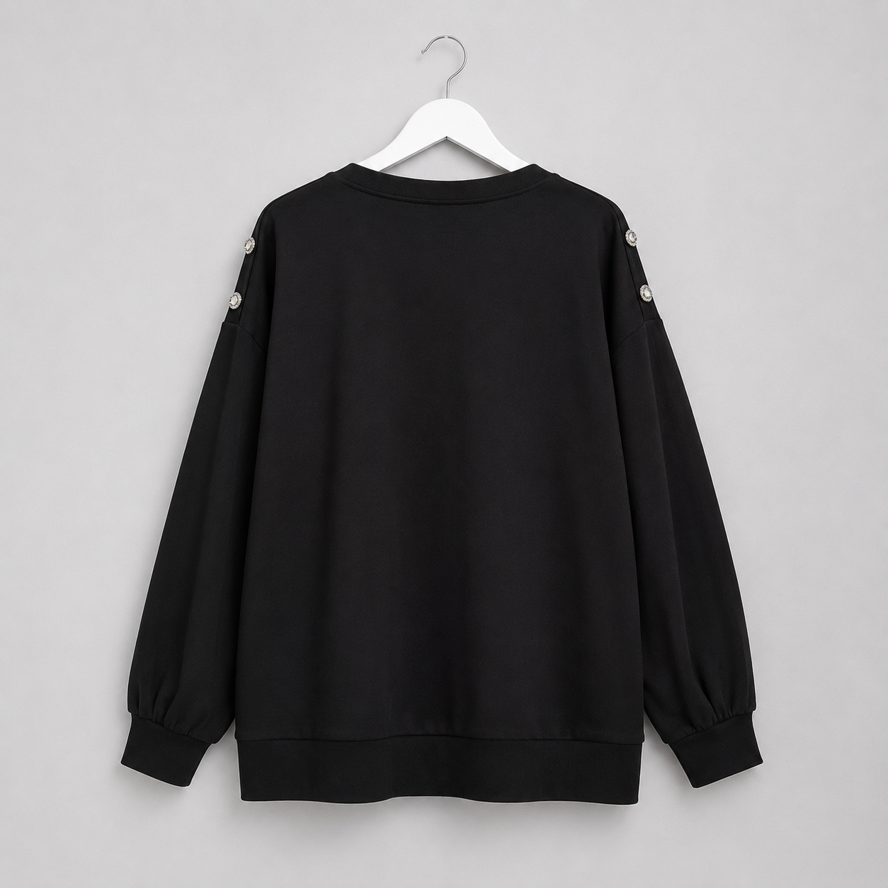 Damen-Sweatshirt mit Strass-Applikation und Schulterknöpfen | Gr. 40-46 | Schwarz