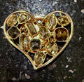 Herzbrosche/Schalclip in Gold mit gelben Schmucksteinen